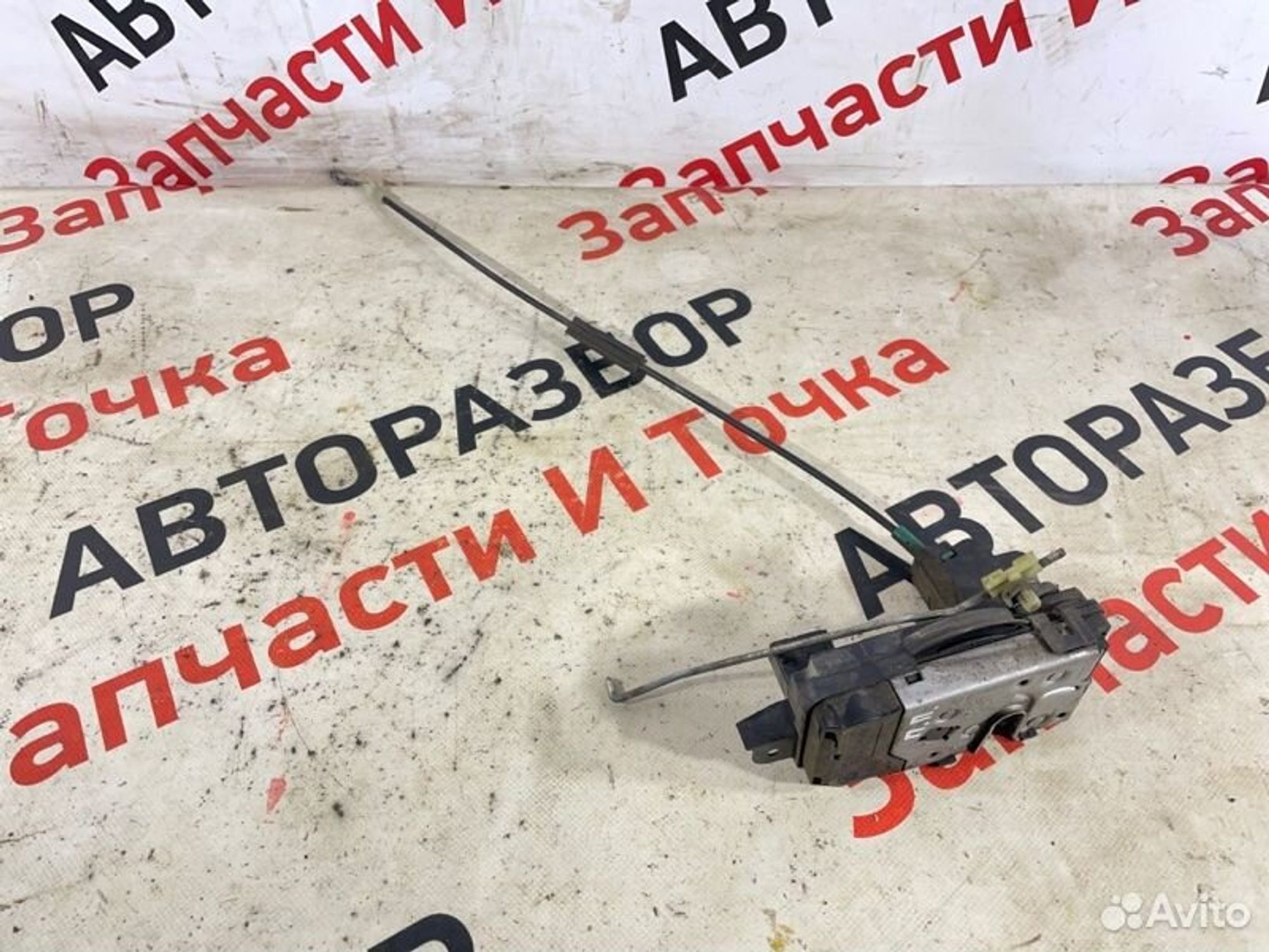 Замок боковой двери передний правый Opel Astra H