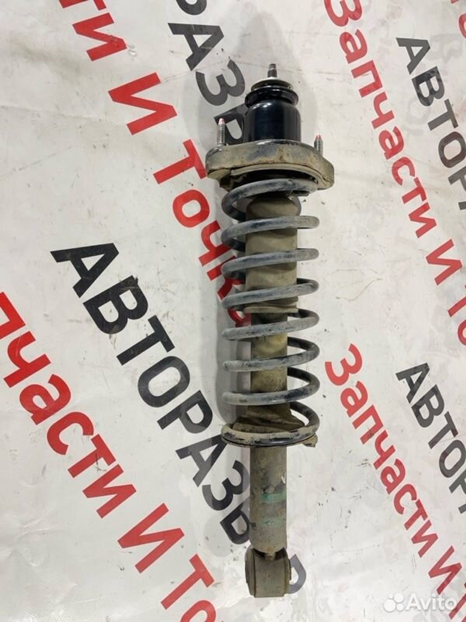 Амортизатор подвески задний левый Mitsubishi