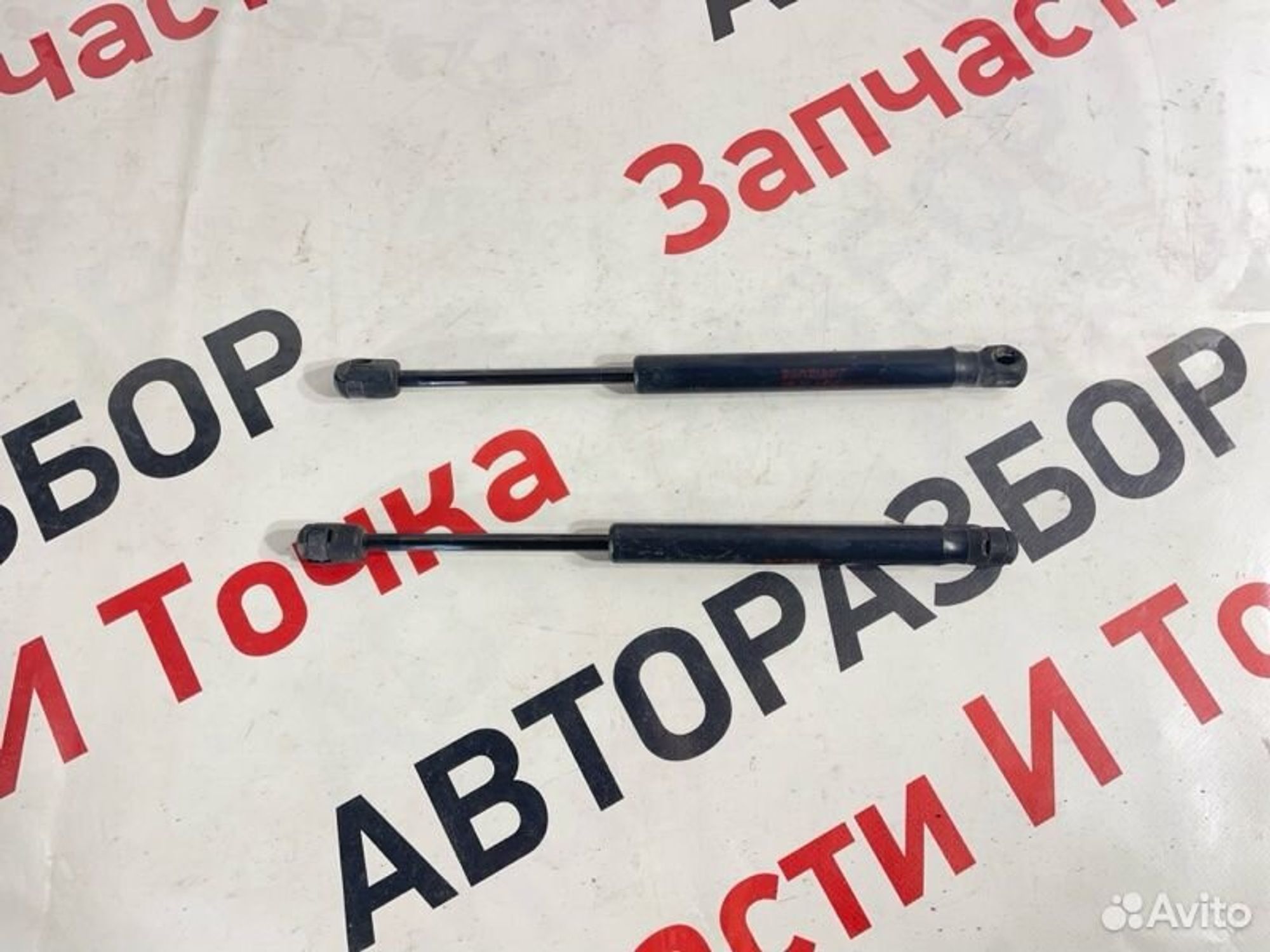 Амортизатор капота Mitsubishi Lancer седан 2.0
