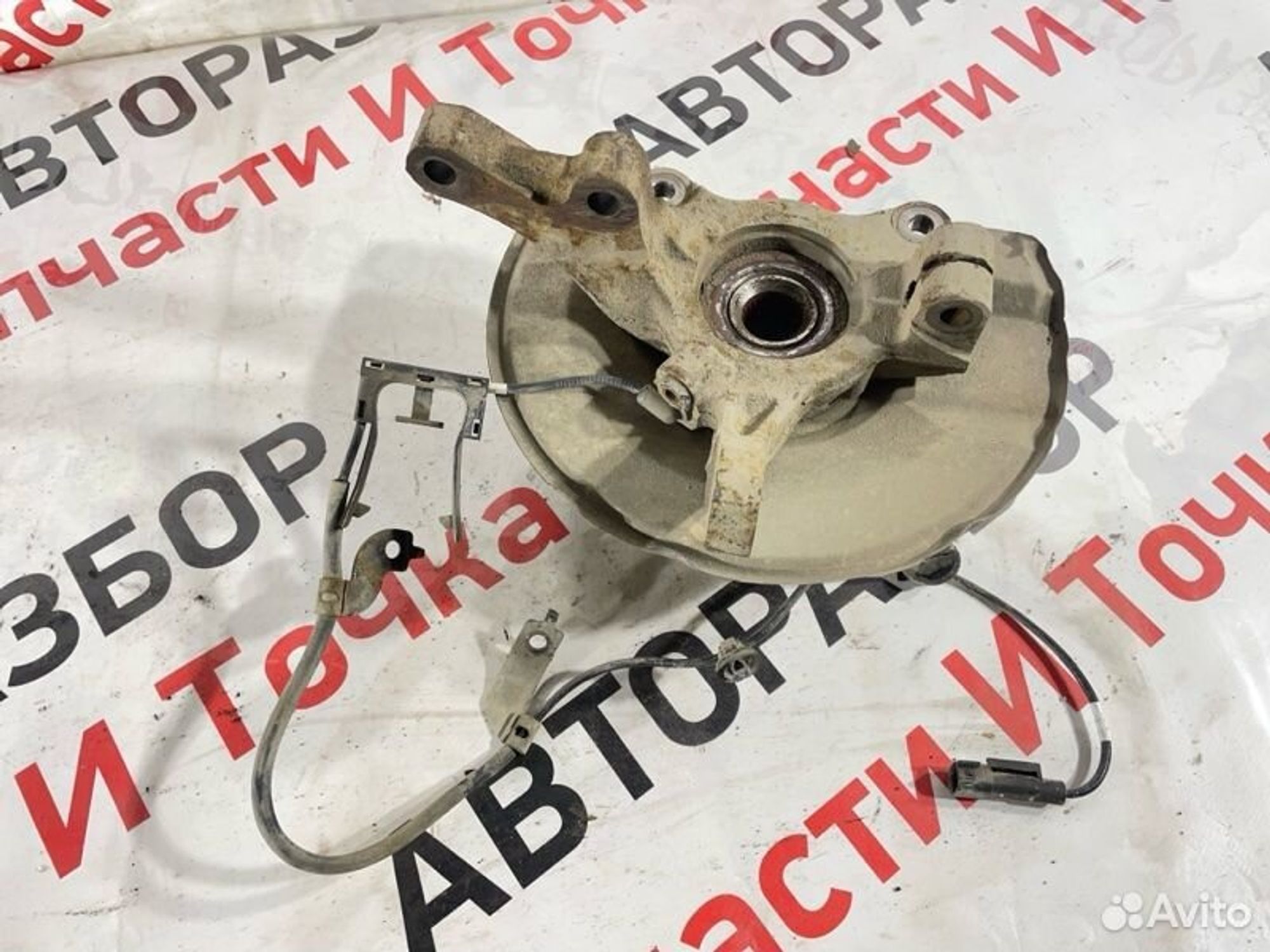 Кулак поворотный передний левый Mitsubishi Lancer