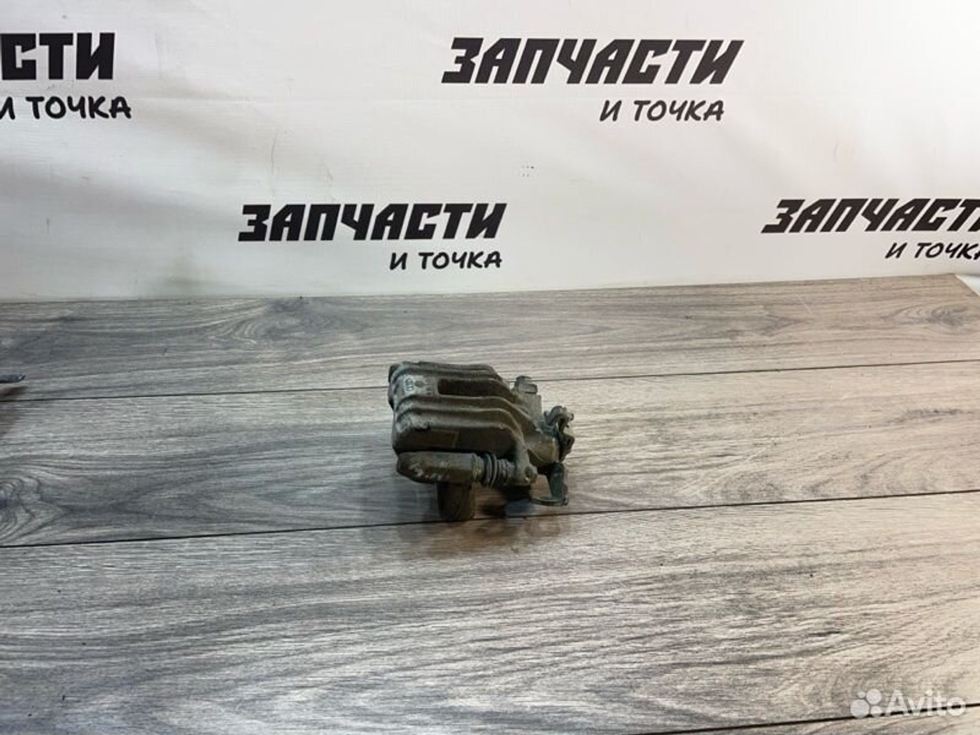 Суппорт тормозной задний левый Volkswagen Polo