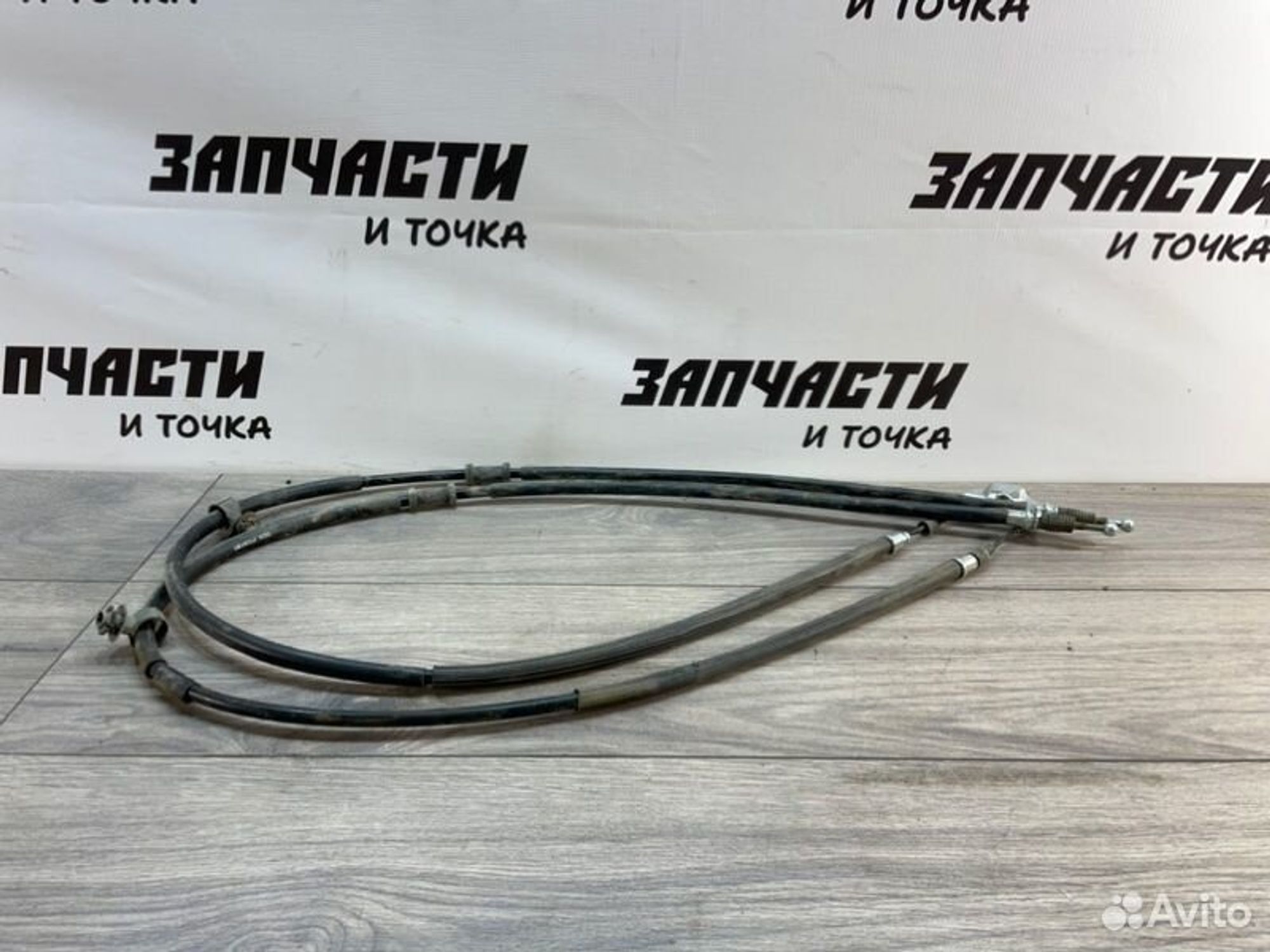Трос стояночного тормоза Opel Astra H хетчбек