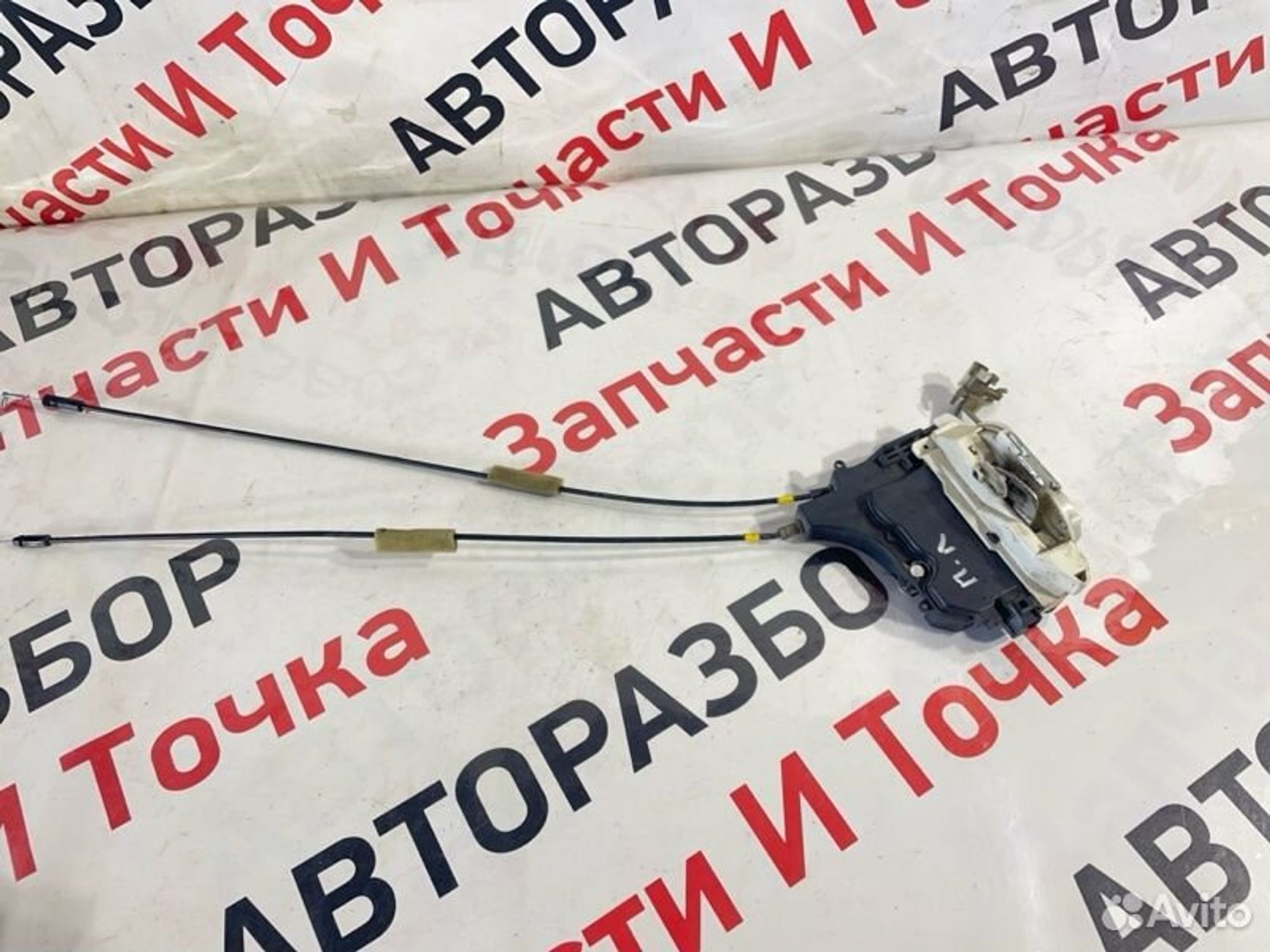 Замок боковой двери передний левый Mitsubishi