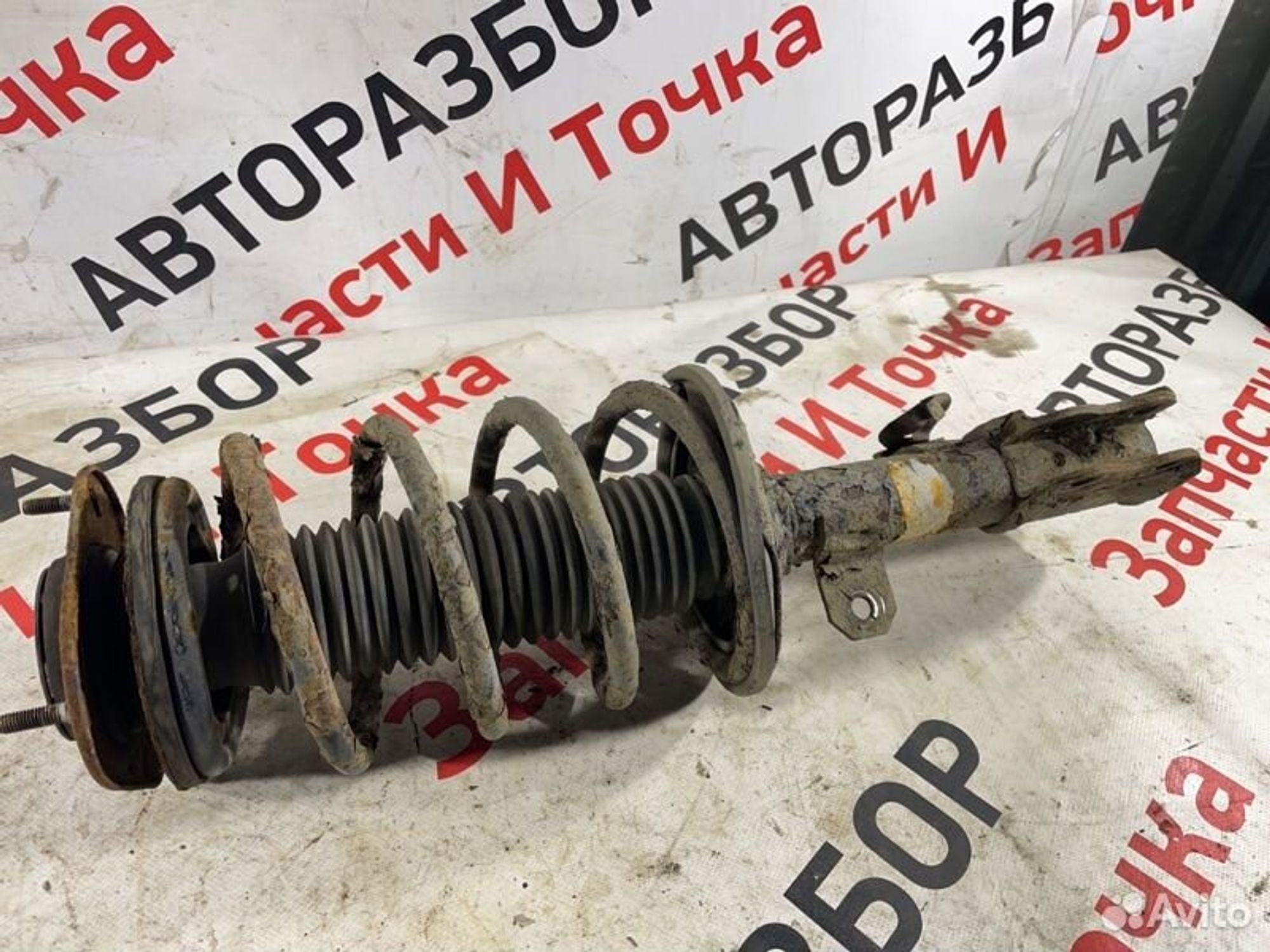 Стойка подвески передняя правая Geely Emgrand 7